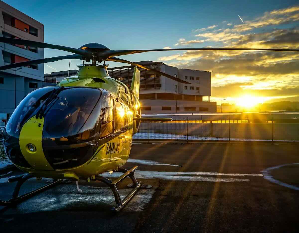 Photo of a helicopter at sunset